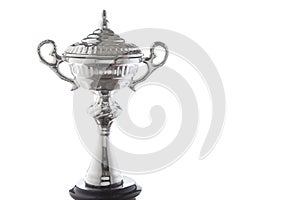 Close up of silver trophy isolated on white background. Winning awards with copy space.