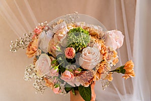 close up of simple spring flowers bouquet with natural light. roses  carnation  gillyflower. natural light. concept of springtime