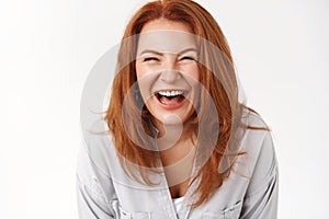 Close-up sincere carefree joyful redhead mature woman enjoy family summer vacation laughing out loud smiling toothy grin