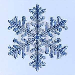 Close Up of a Single Blue Snowflake on a Light Background