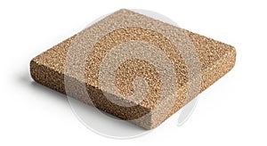 Close up of a single bouillon cube with a textured surface