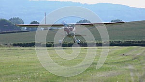 Close up of a single engine aircraft landing