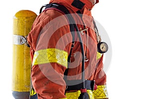 close up single fireman in fire fighting protection suit and equipment isolated on white background