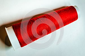 Close-up of a Single large spool of red thread