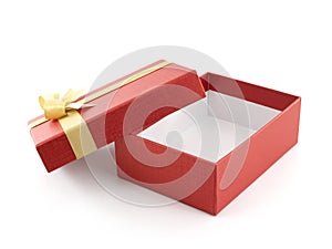 close up single open and empty red gift box with golden ribbon bow on white background