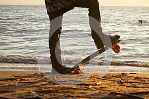 Close-up of the skateboarders feet