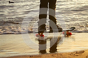 Close-up of the skateboarders feet