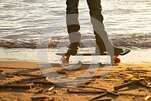 Close-up of the skateboarders feet