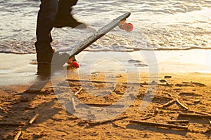 Close-up of the skateboarders feet