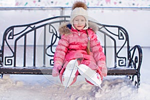 Close-up of skates on the little girl