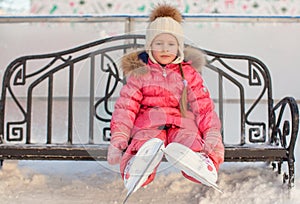 Close-up of skates on the little girl