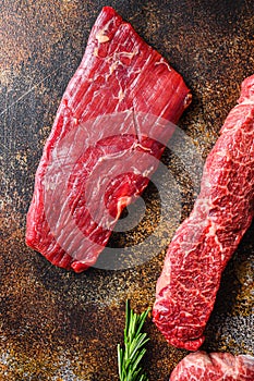 Close up Skirt Steak, Flank steak, cut near denver alternative beef steak a rustic metall background top view layflat