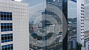 close up of skyscraper glass, abstract building background. View of a modern glass skyscraper reflecting