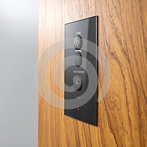 Sleek Smart Home Control Panel on Wood