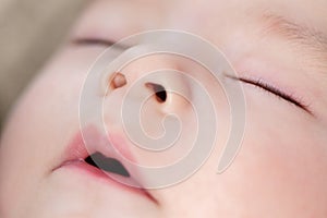 Close up of sleeping asian baby boy face