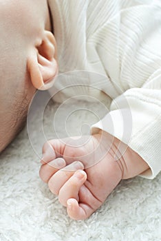 Close Up Of Sleeping Baby Girl's Hand