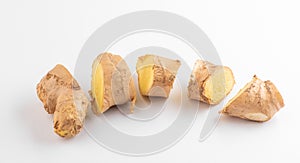 Close-up on a sliced ginger root on white background