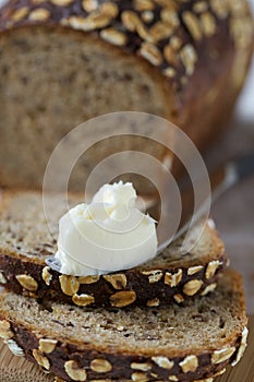 Close up of Sliced Grain Bread with Butter