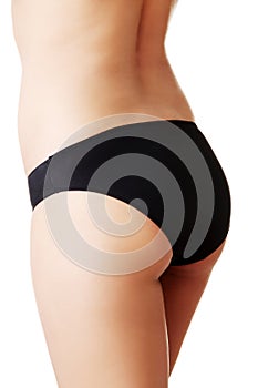 Close up on slim woman buttocks in underwear