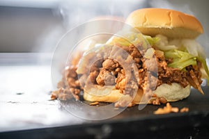 close-up of sloppy joe meat, steam rising