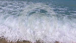 Close up slow motion of sea waves on tropical paradise beach