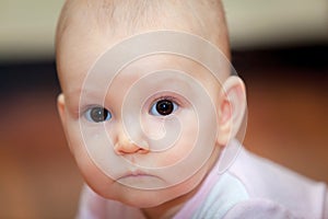 Close-up of a small child who cries but does not