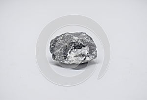 Close up of small gray-white stones isolated on a white background, Light and shadow under the rock, one rock