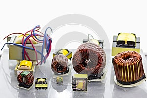 Close up small of many coil and electric transformer for industrial with copy space photo