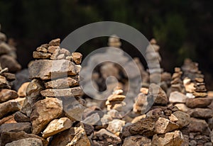 A close-up of the small pyramids made of stones in the park. Abstract Rustler canyon, Provencal Colorado