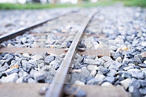 Close-up of small railroad tracks on gravel rocks