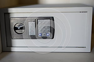 Close-up of small safe. Safe at home or hotel