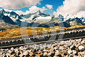 Close up of small train railways in mountains