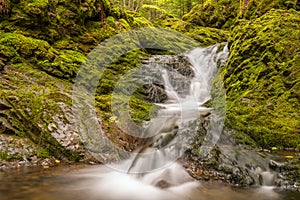 Close-up of small waterfall in the park (Slow shutter speed)