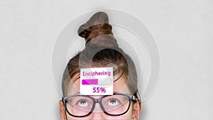 Close-up, a smart teenager face, a child in glasses, with a sticker on his forehead. an animation of Enciphering process