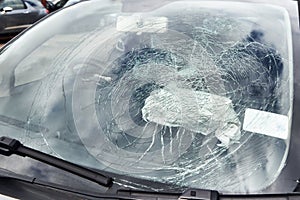Close Up Of Smashed Windscreen On Vandalised Car