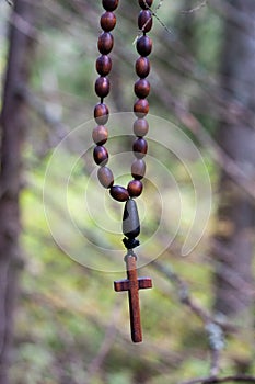 Close up on smile beauty handmade wooden cross photo