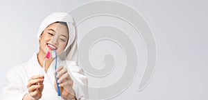 Close up of Smile woman brush teeth. great for health dental care concept,  over white background. asian.