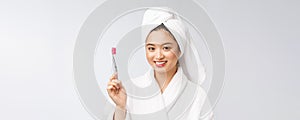 Close up of Smile woman brush teeth. great for health dental care concept,  over white background. asian.