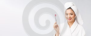 Close up of Smile woman brush teeth. great for health dental care concept,  over white background. asian.