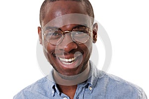 Close up smiling african american man with glasses against white background