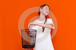 Close up smiling calm serious young girl throw away her glasses