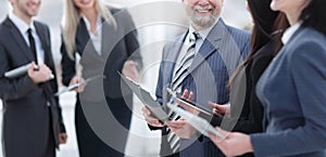 Close up.smiling group of business people before business meetings photo