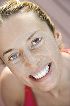 Close-up of smiling woman.