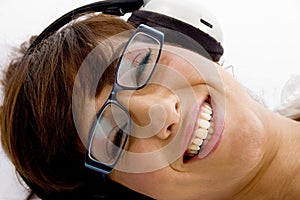 Close up of smiling woman listening to music