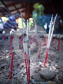 Close up smoke from incense sticks.