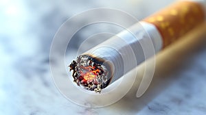 Close-up of a Smoldering Cigarette with Ash and Smoke