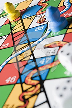 Close -Up Of Snakes And Ladders Board photo