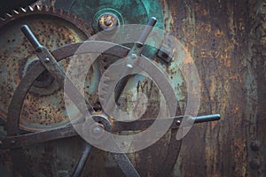 Close-up snapshot of ancient gears mechanism, Steampunk background.