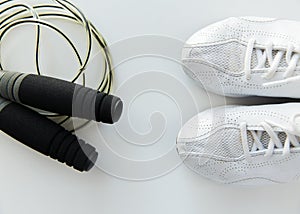 Close up of sneakers and skipping rope