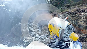 close-up snow cannon at ski resort in winter